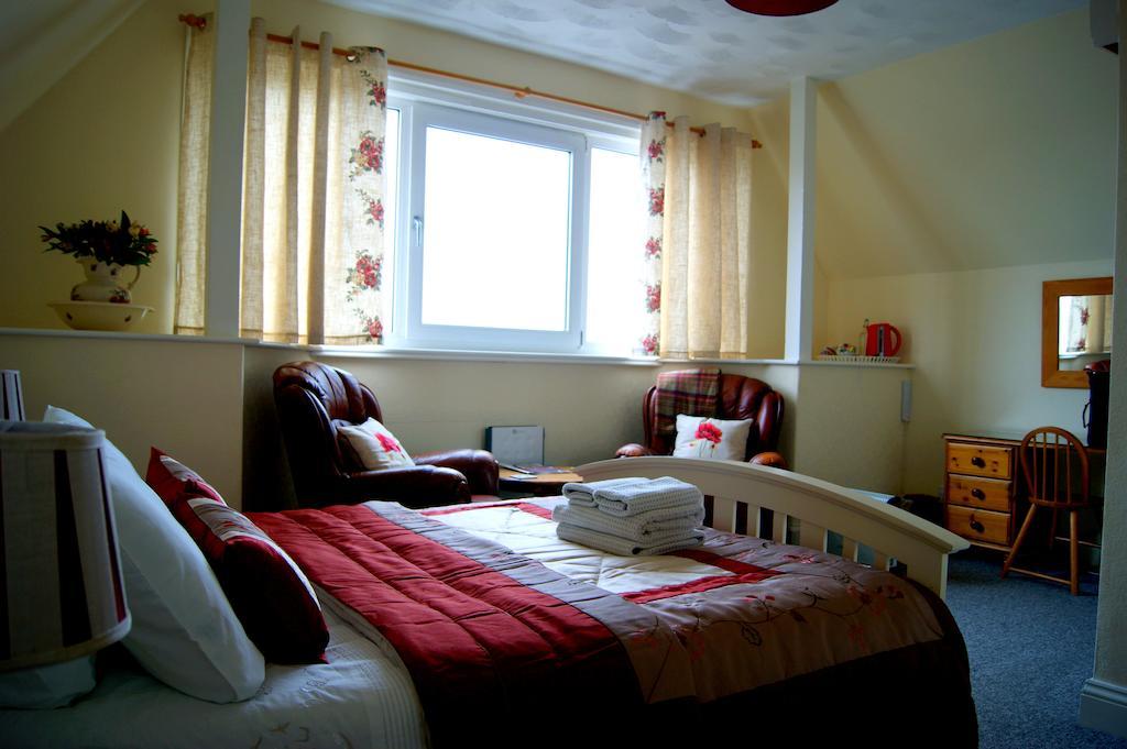 Sunset Guest House Hunstanton Rom bilde A bedroom in a typical B&B