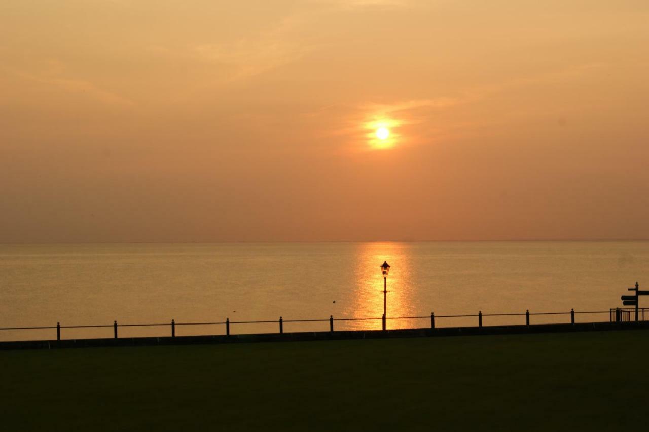 Sunset Guest House Hunstanton Rom bilde Sunset over the bay